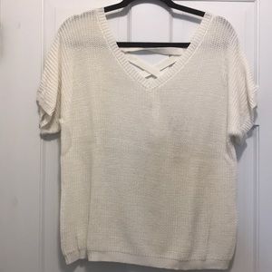 White top with cross cross tie in the back